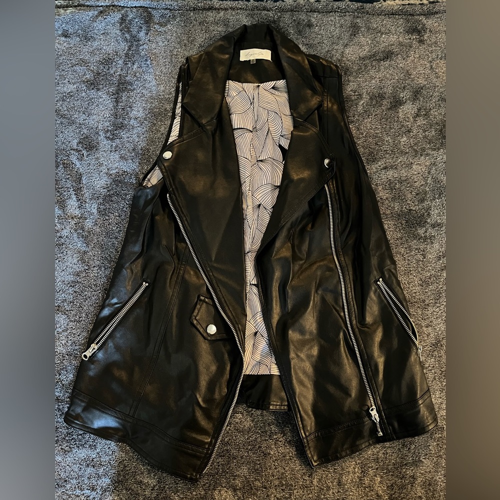 Sugarlips brand faux leather moto vest. Size small.